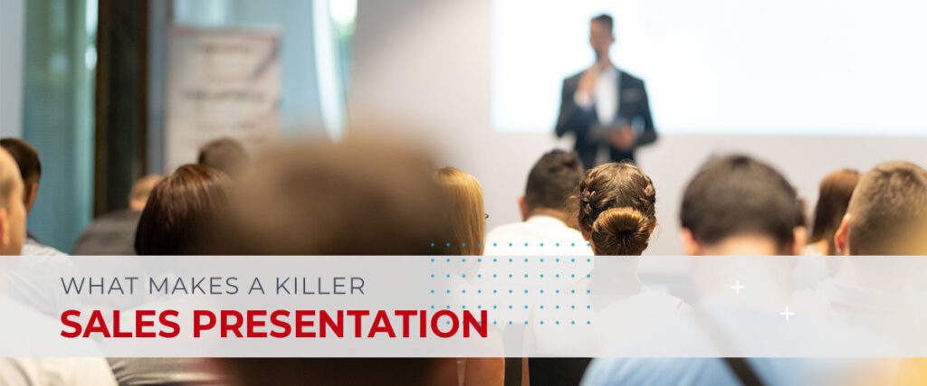 Audience members seated and listening to a speaker at the front of a conference room. Text in the foreground reads, "What Makes a Killer Sales Presentation." The speaker is shown in blurred focus, highlighting the slide on screen.