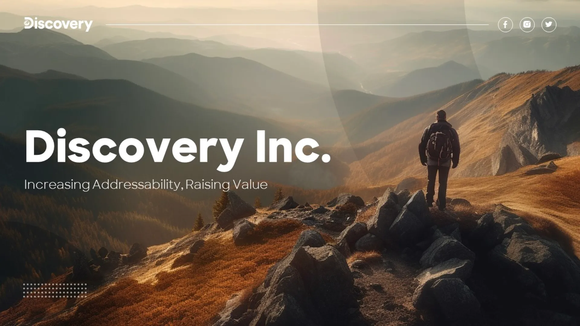 A hiker stands on a rocky mountain peak during sunrise, overlooking layers of misty mountain ranges. The text reads "Discovery Inc.: Increasing Addressability, Raising Value." Logos for Facebook, Twitter, and Instagram are displayed in the top-right corner of the presentation slide.